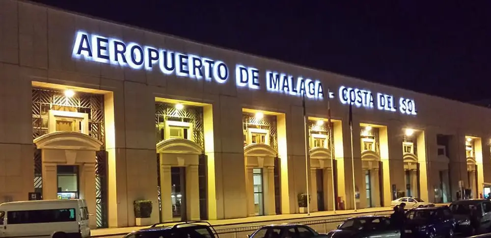 Front view of Malaga Costa del Sol Airport AGP Departure terminal at night in Spain